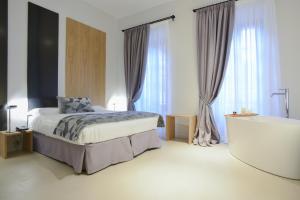 Ліжко або ліжка в номері Viminale View Hotel