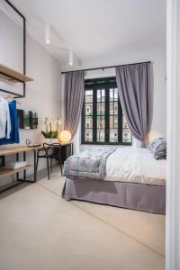 Ліжко або ліжка в номері Viminale View Hotel