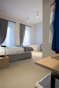 Ліжко або ліжка в номері Viminale View Hotel