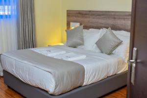 Postel nebo postele na pokoji v ubytování Amanda Resort + 33 fotografií