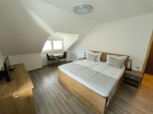 Guesthouse Haler 객실 침대