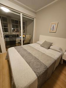 Posteľ alebo postele v izbe v ubytovaní Hotel Cais