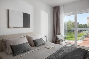 Postel nebo postele na pokoji v ubytování Villa Sepera + 4 fotografie