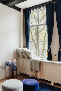 Ein Sitzbereich in der Unterkunft 1637: Historic Canal View Suites