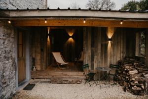 Zahrada ubytování La Tanière à Durbuy - Gîte nature et détente + 6 fotografií