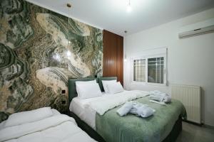 Ένα ή περισσότερα κρεβάτια σε δωμάτιο στο SeaGreen Luxury Apartment