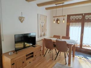 Televízia a/alebo spoločenská miestnosť v ubytovaní ES CÒVES