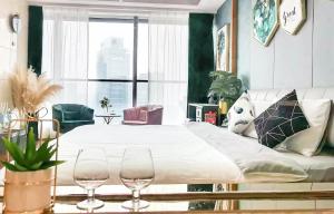 Postel nebo postele na pokoji v ubytování 柃居 B&B - Suzhou Center Apartment