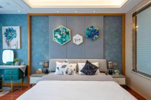 Postel nebo postele na pokoji v ubytování 柃居 B&B - Suzhou Center Apartment