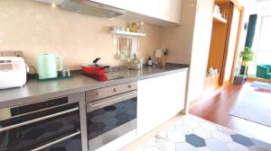 Kuchyň nebo kuchyňský kout v ubytování 柃居 B&B - Suzhou Center Apartment