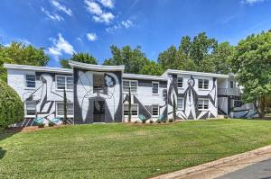 a house with a mural on the side of it at Experience Myers Park in Style in Charlotte