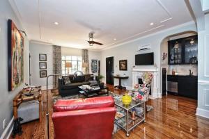 a living room with a couch and a table at Relax or Entertain in Luxurious 2BR with Patio in Charlotte