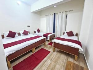 Postel nebo postele na pokoji v ubytování Hotel Aashirwad