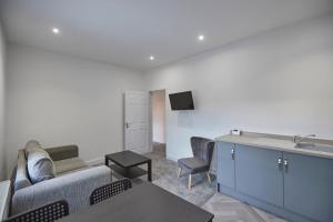 TV a/nebo společenská místnost v ubytování Zetland House Apartment 5 Loftus