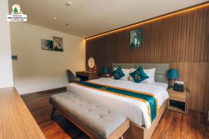 Postel nebo postele na pokoji v ubytování Rung Thong Nui Voi Villa & Resort