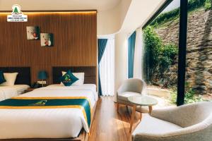 Postel nebo postele na pokoji v ubytování Rung Thong Nui Voi Villa & Resort