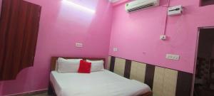 Letto o letti in una camera di OYO 82076 Hotel Balaji Palace