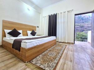 Postel nebo postele na pokoji v ubytování Hotel Aashirwad