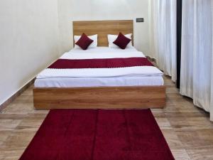 Postel nebo postele na pokoji v ubytování Hotel Aashirwad