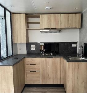 Kuchyň nebo kuchyňský kout v ubytování MH 3CH à l'océan Landais chez Claiclé + 14 fotografií