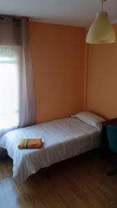 Postel nebo postele na pokoji v ubytování Apartamento Ángel