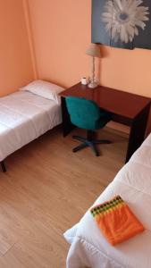 Postel nebo postele na pokoji v ubytování Apartamento Ángel + 4 fotografie