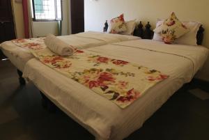Letto o letti in una camera di Sneh Deep Guest House