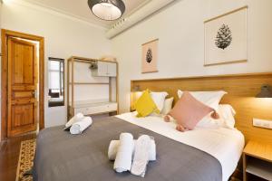 Posteľ alebo postele v izbe v ubytovaní Central Apartments Barcelona