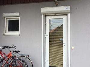 a pair of bikes parked outside of a house at AV villa in Nida