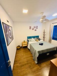 Ένα ή περισσότερα κρεβάτια σε δωμάτιο στο Casa Portugrega