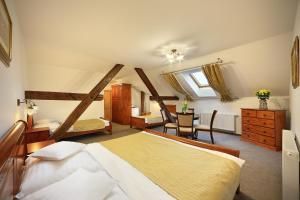 Ένα ή περισσότερα κρεβάτια σε δωμάτιο στο Pension Rozmarýna