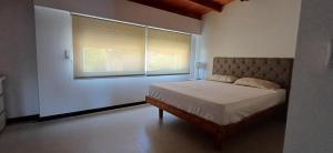 Ένα ή περισσότερα κρεβάτια σε δωμάτιο στο Duplex French