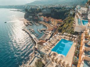 an aerial view of a resort next to the water at Hotel Belair in Sorrento