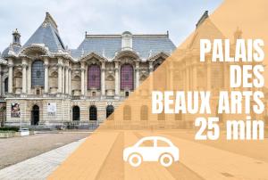 a small car in front of a large building at La Sister - Les Demeures d 'Adrien in Carvin