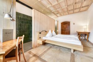 Letto o letti in una camera di Propstei Sankt Gerold