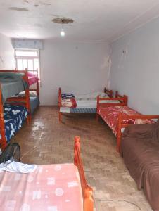 Letto o letti in una camera di Quarto Moinhos de Vento Altre 2 foto