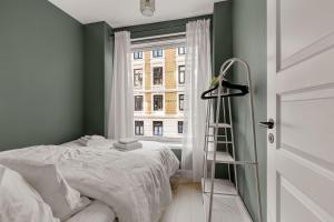 Ένα ή περισσότερα κρεβάτια σε δωμάτιο στο Your perfect stay in central Oslo!