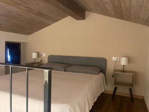 A bed or beds in a room at L'angolo nascosto