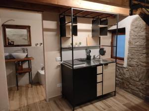 A kitchen or kitchenette at L'angolo nascosto