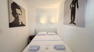 Posteľ alebo postele v izbe v ubytovaní Appartement 753, 4 personnes, vue mer By Palmazur + 37 fotografií