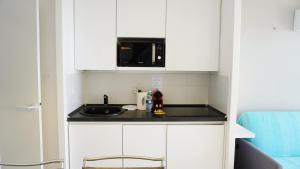 Kuchyňa alebo kuchynka v ubytovaní Appartement 753, 4 personnes, vue mer By Palmazur