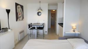 Posteľ alebo postele v izbe v ubytovaní Appartement 753, 4 personnes, vue mer By Palmazur