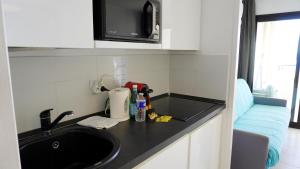 Kuchyňa alebo kuchynka v ubytovaní Appartement 753, 4 personnes, vue mer By Palmazur