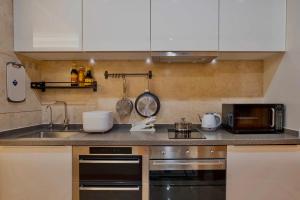 Kuchyň nebo kuchyňský kout v ubytování 柃居 B&B - Suzhou Center Apartment