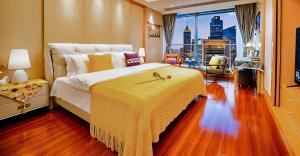 Postel nebo postele na pokoji v ubytování 柃居 B&B - Suzhou Center Apartment