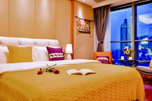 Postel nebo postele na pokoji v ubytování 柃居 B&B - Suzhou Center Apartment