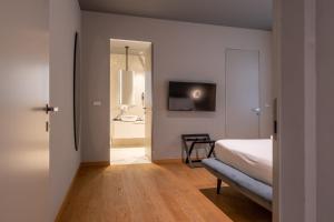 Posteľ alebo postele v izbe v ubytovaní Prestige Apartments Torino