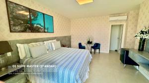 Katil atau katil-katil dalam bilik di Casa Perola 5 Suítes Próxima da Praia em Guarajuba +39 gambar