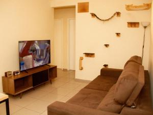 TV a/nebo společenská místnost v ubytování Apartamento Buritis 01