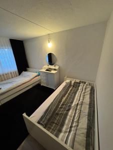 Postel nebo postele na pokoji v ubytování AMT Hotel Hamburg